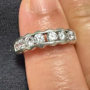 925 Sterling  Silver half  Band with bezel CZ 7  Stones $30